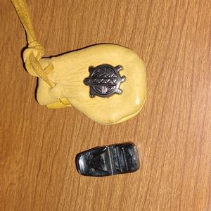 Silver tone turtle amulet with black Hawaiian face carved  soapstone cry…